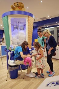 A guest creates a special furry friend at the newest Build-A-Bear Workshop at Mall of America in Bloomington, Minn. (Photo by Adam Bettcher/Getty Images for Build-A-Bear.)