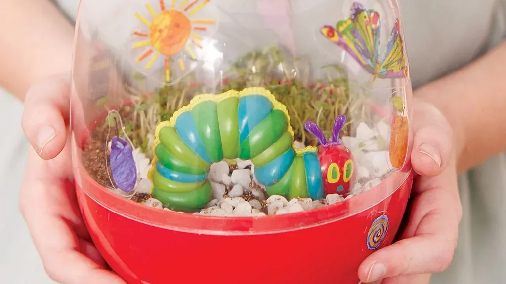 The Very Hungry Caterpillar inside a hand-held terrarium